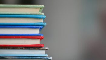 shallow focus photography of books